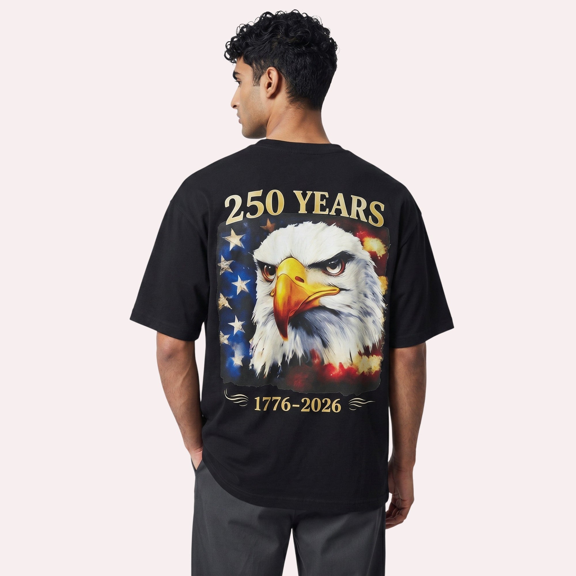 TrendyShift.Com black cotton t-shirt with a large back graphic of a bald eagle and distressed American flag design.