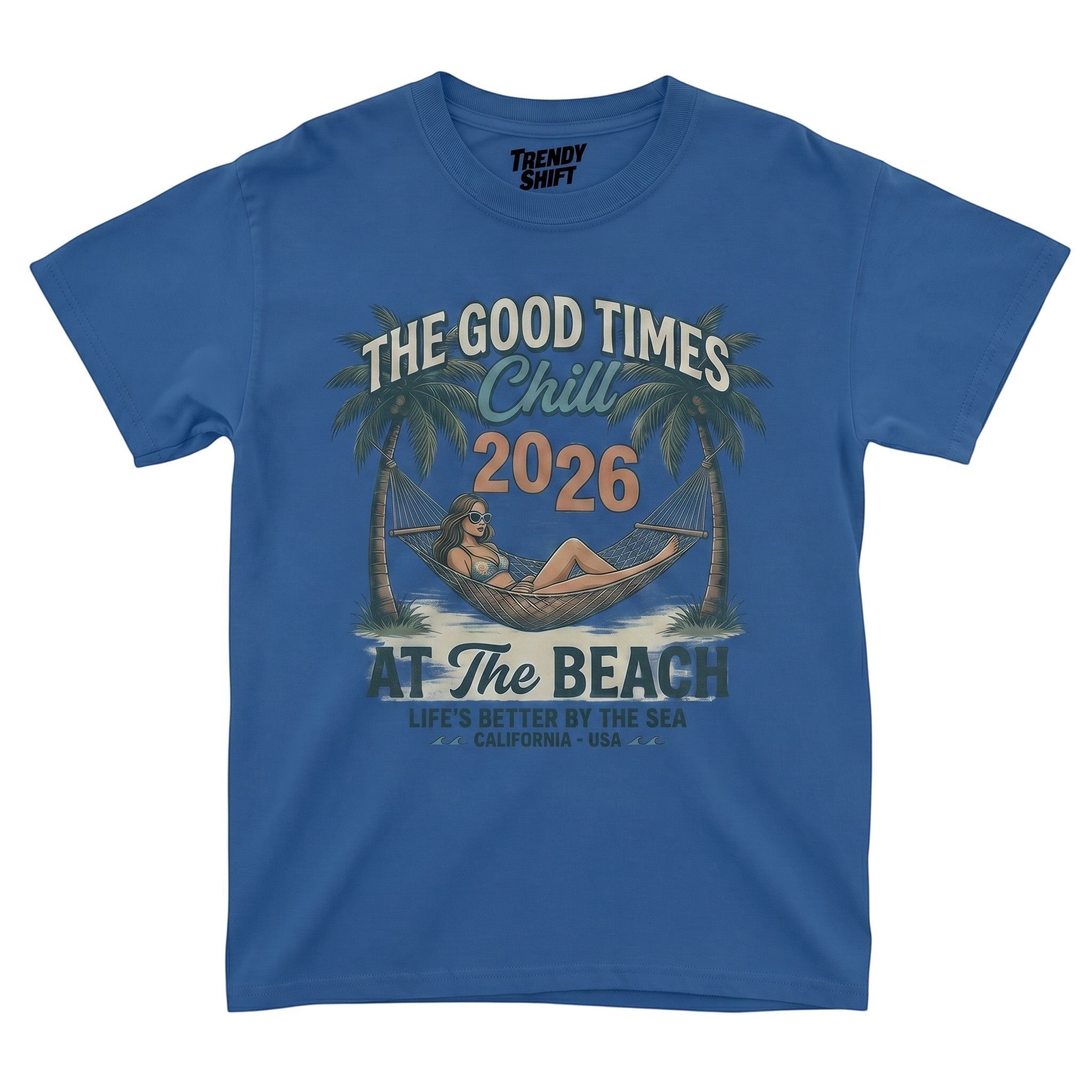 TrendyShift.Com blue graphic t-shirt featuring a retro beach scene with a woman in a hammock and palm trees.