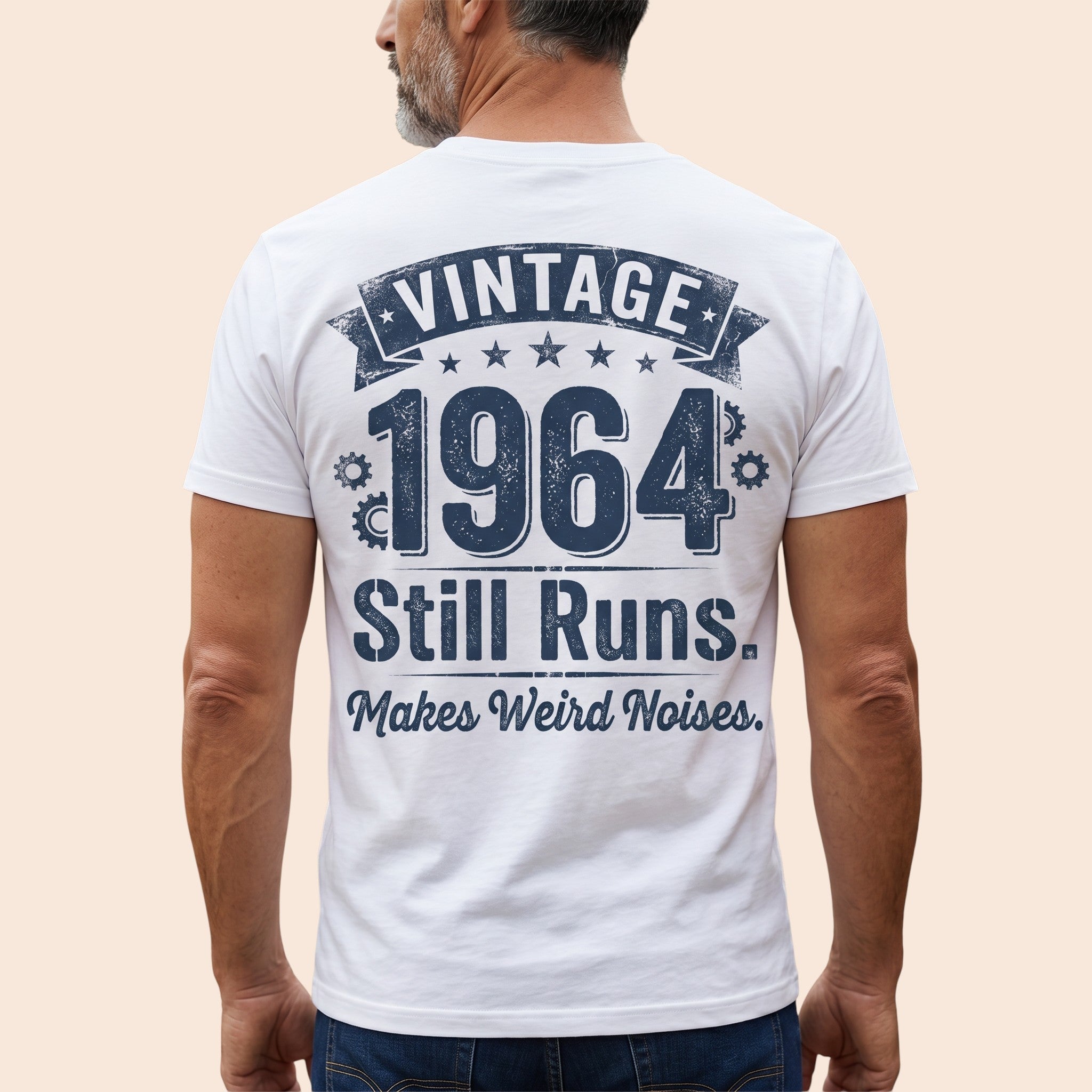 TrendyShift.Com white 100% cotton t-shirt with Vintage 1964 Still Runs Makes Weird Noises graphic on the back